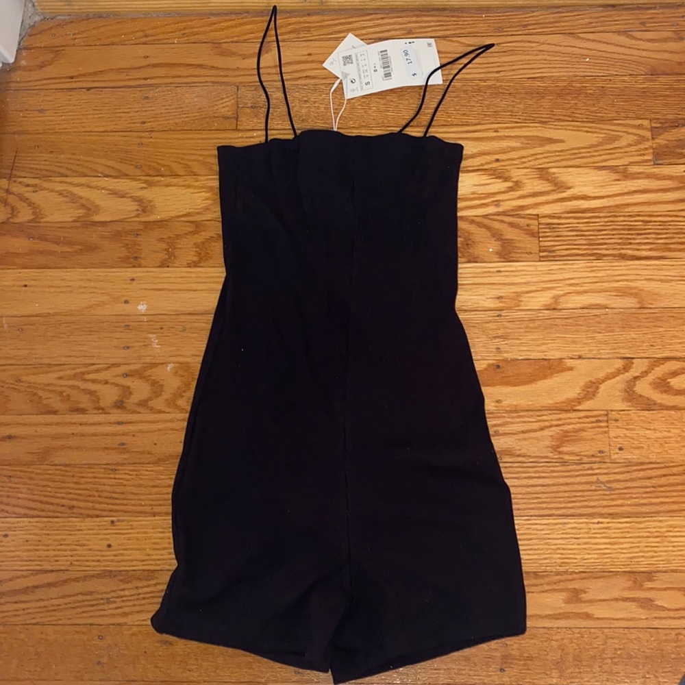 black romper so cute and easy to dress up!